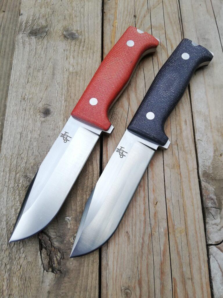 USK urban survival knives with red and black handles